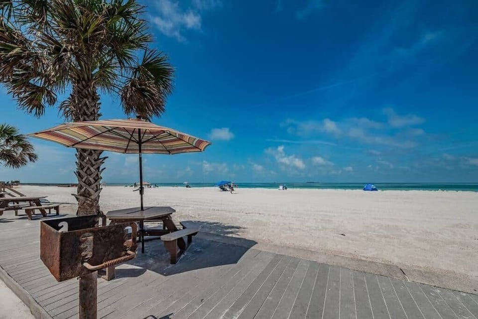 Make vacation memories with beachfront grilling and picnics steps from the sand.