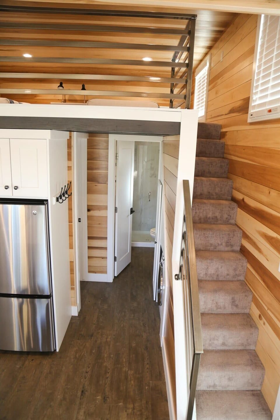 Head up the stairs to discover the loft escape.