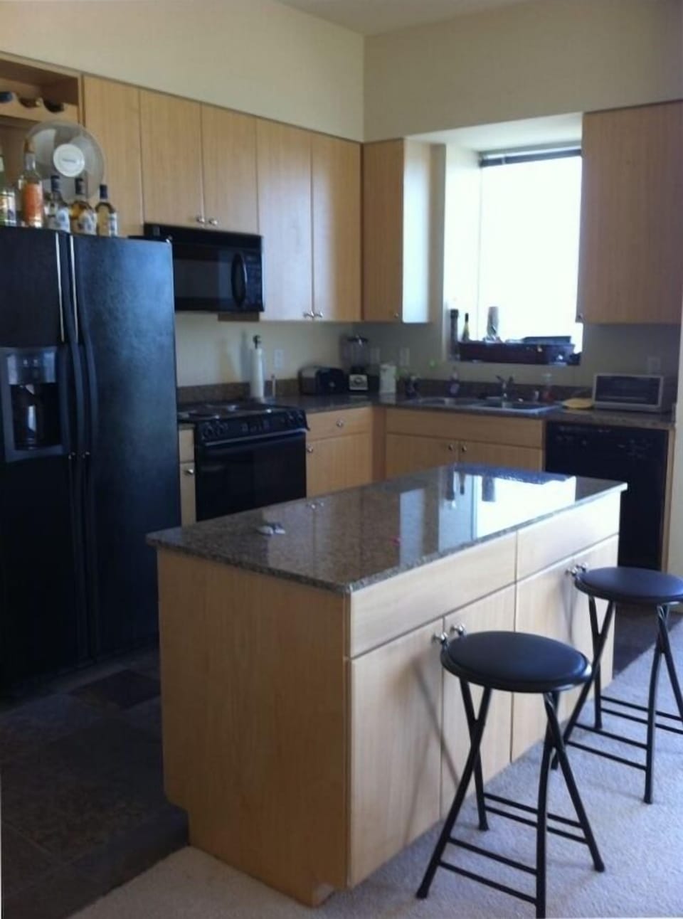 Full Kitchen with granite counter tops, new appliances, and all dishes
