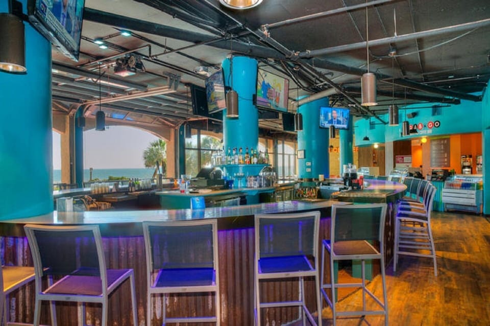 Enjoy a drink at the bar with the ocean in site.