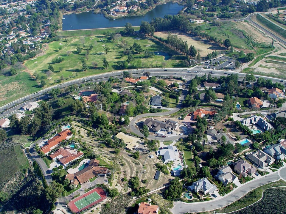 9 hole golf course and lake at the bottom of the street 