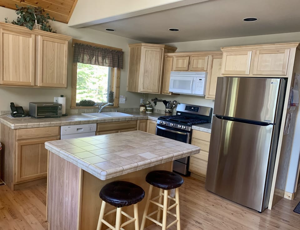 Well stocked kitchen includes guest access to seasonings, oils, & pantry items.