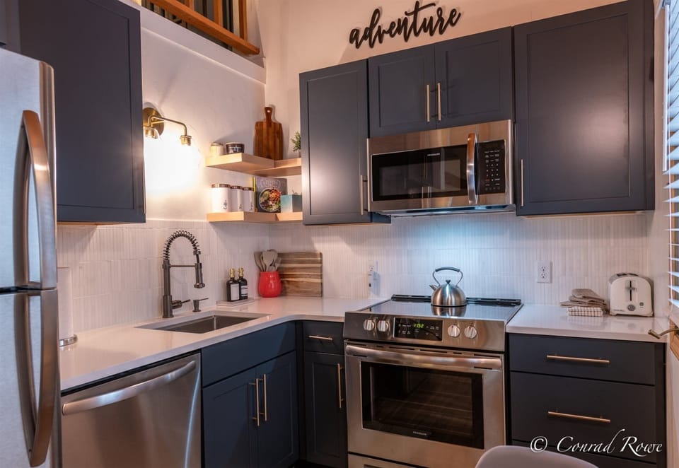Electric stove microwave dishwasher and refrigerator