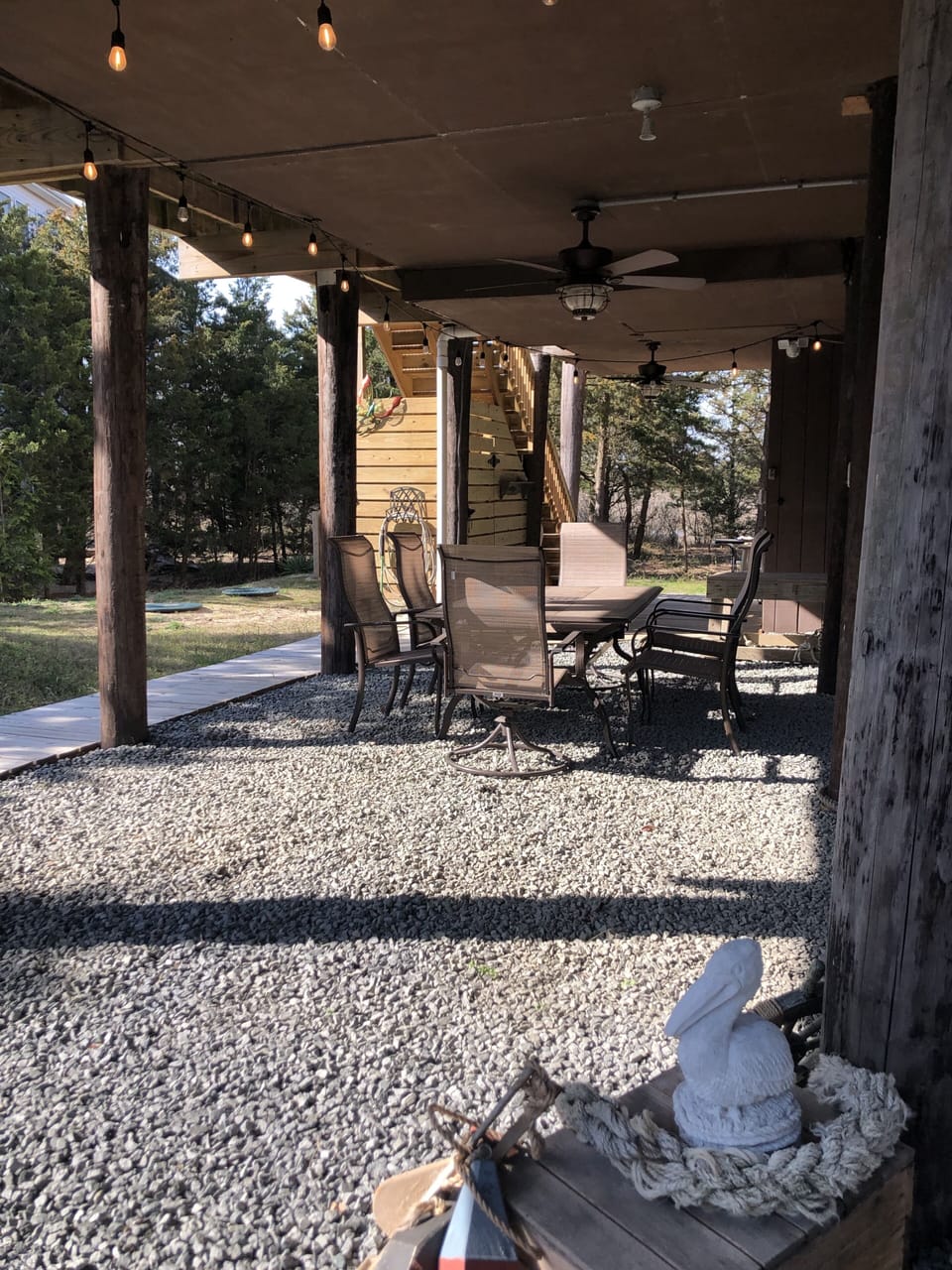Shaded below deck area with seating for 6. 