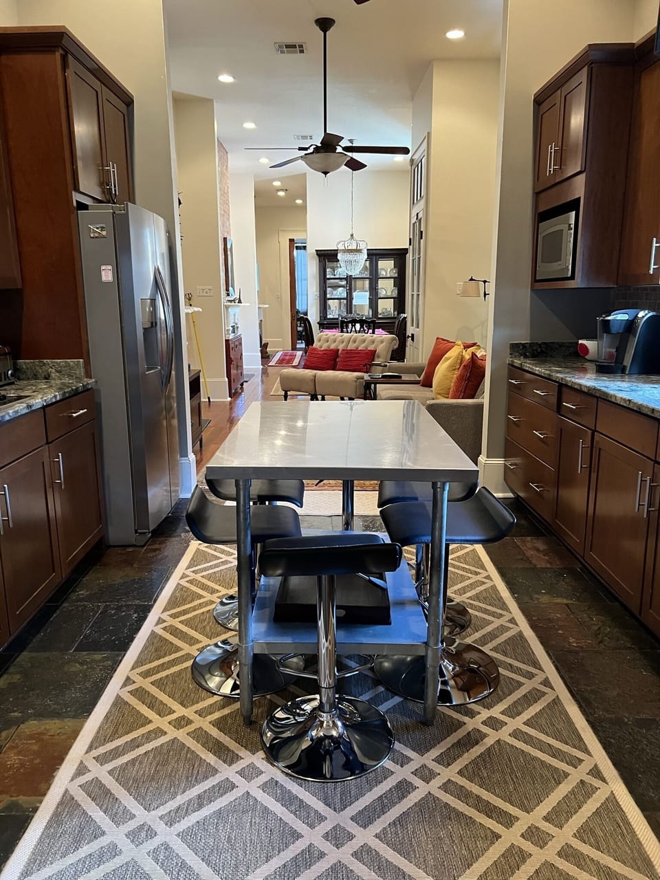 Double sided kitchen, bakers table in center for gathering. Seating for 6, enjoy