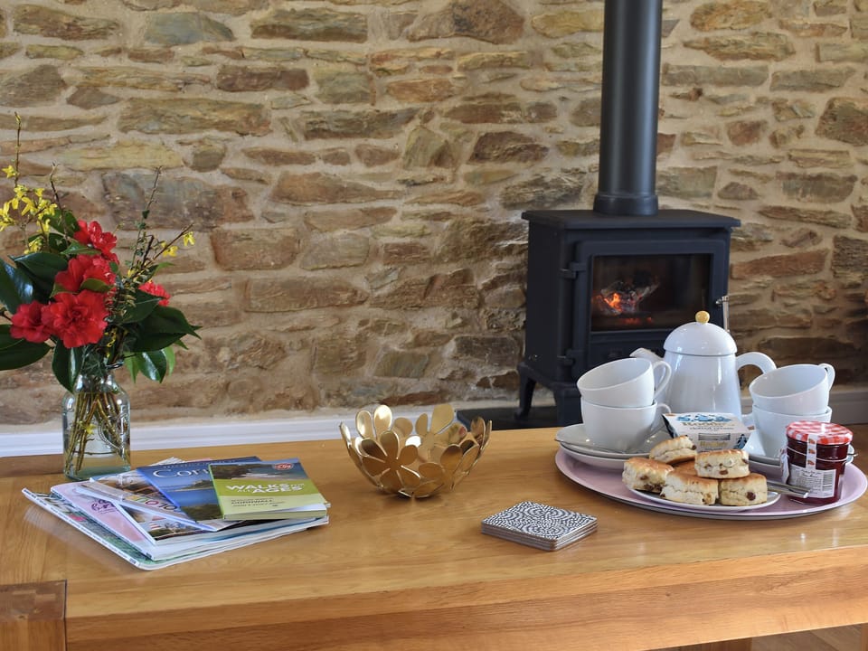 Relax in front of the warming log burner | Bull Pen - Morwenna Barns, Mount Hawke, near St Agnes