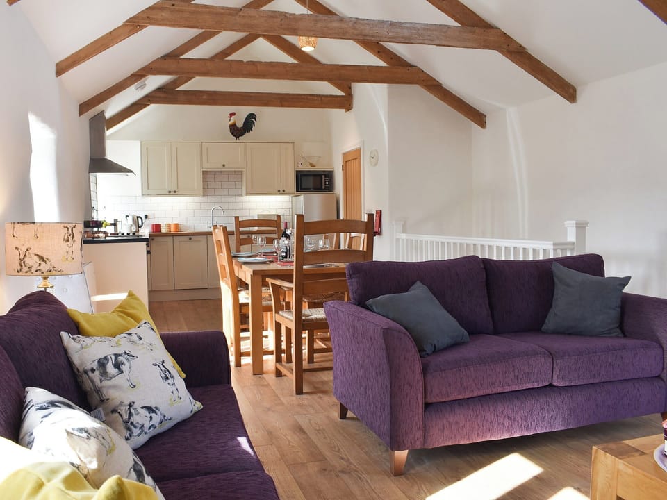 Comfortable sofas in the living area | Bull Pen - Morwenna Barns, Mount Hawke, near St Agnes