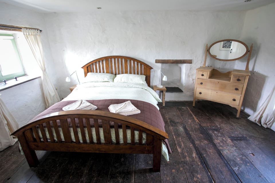 Master bedroom with king size bed on 1st floor