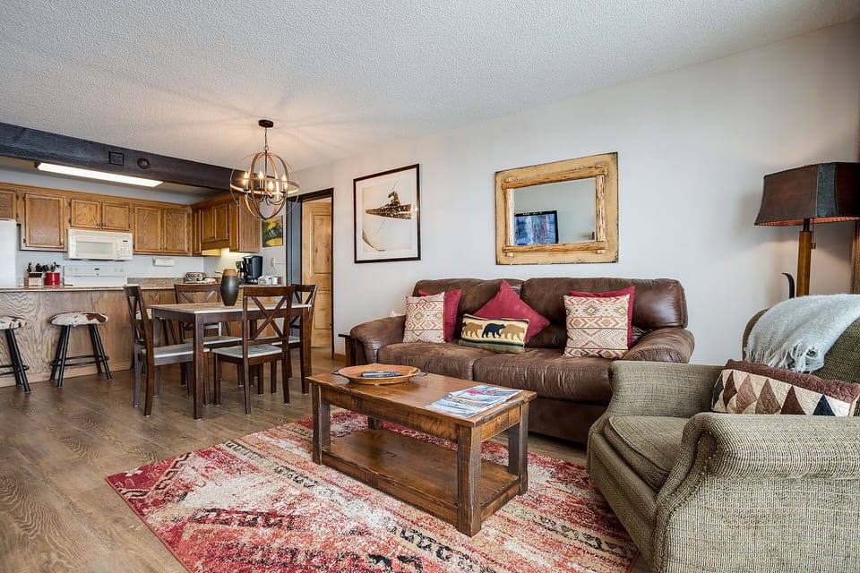 Settle into your cozy retreat with rustic wood furnishings, a fully equipped kitchen, and warm mountain-inspired décor perfect for unwinding.