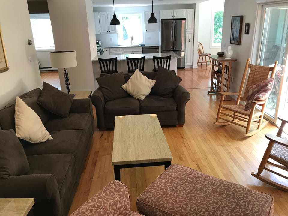 Open living space allows comfortable communication thru kitchen & living room.