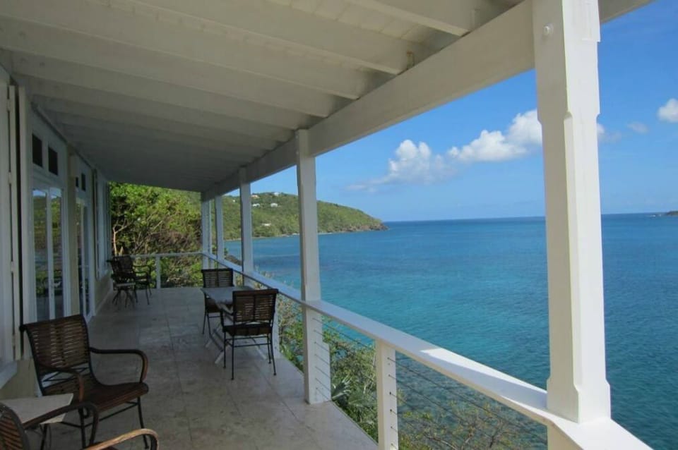 roofed deck with spectacular view of magens bay and pristine reef below