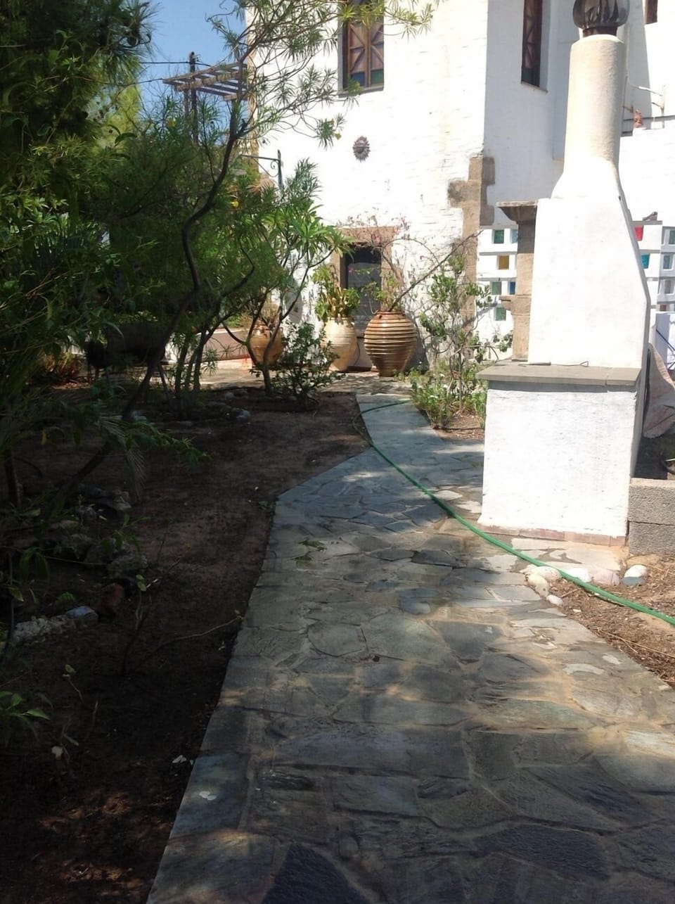 BBQ grill on path to main house.