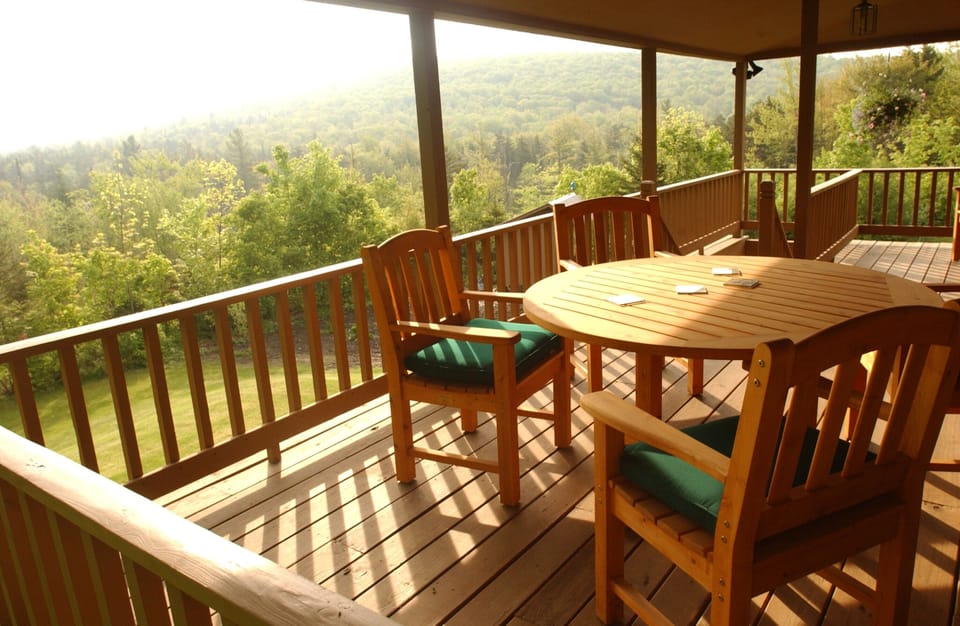 Enjoy views of Spruce Mountain while relaxing or dining on the porch.