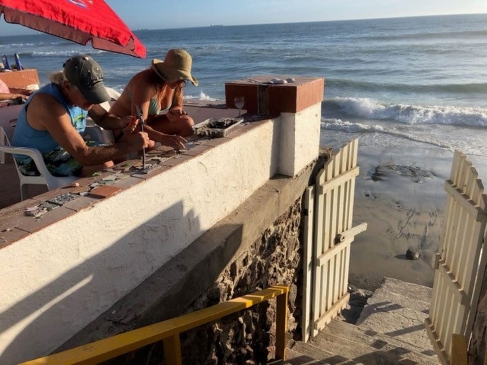 Patio and steps to the beach