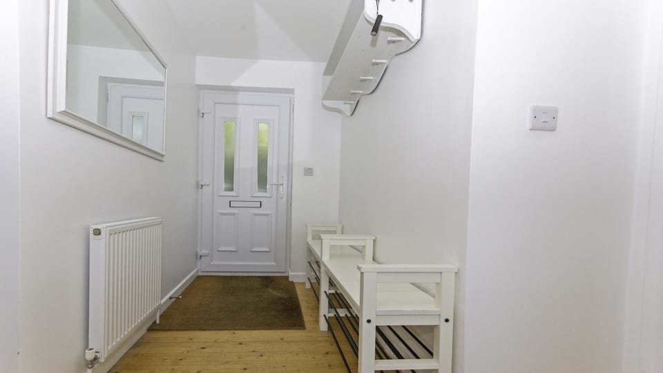 Hallway for coats bags shoes and flip flops