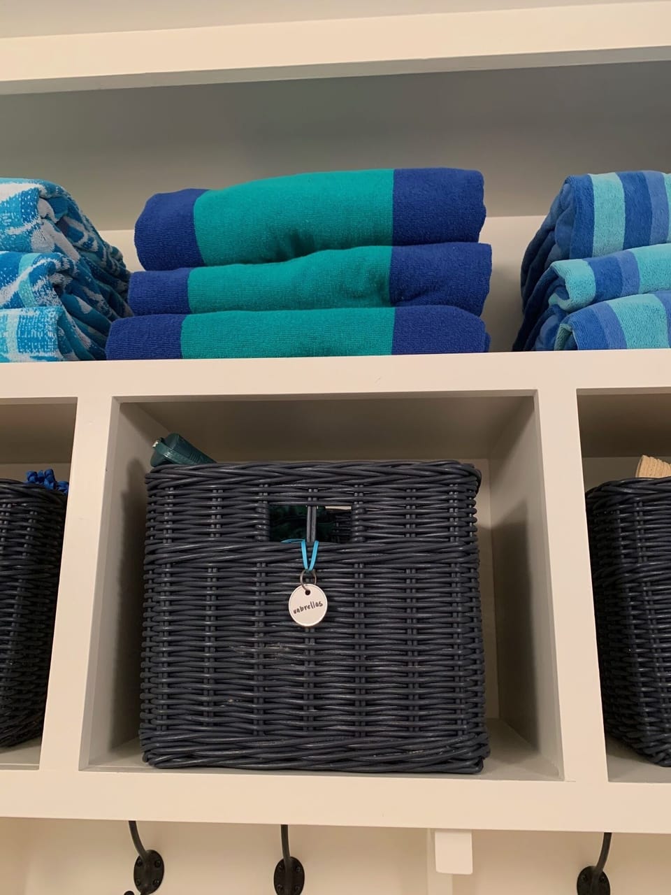 Plenty of beach towels and chairs, as well as umbrellas and boogie boards