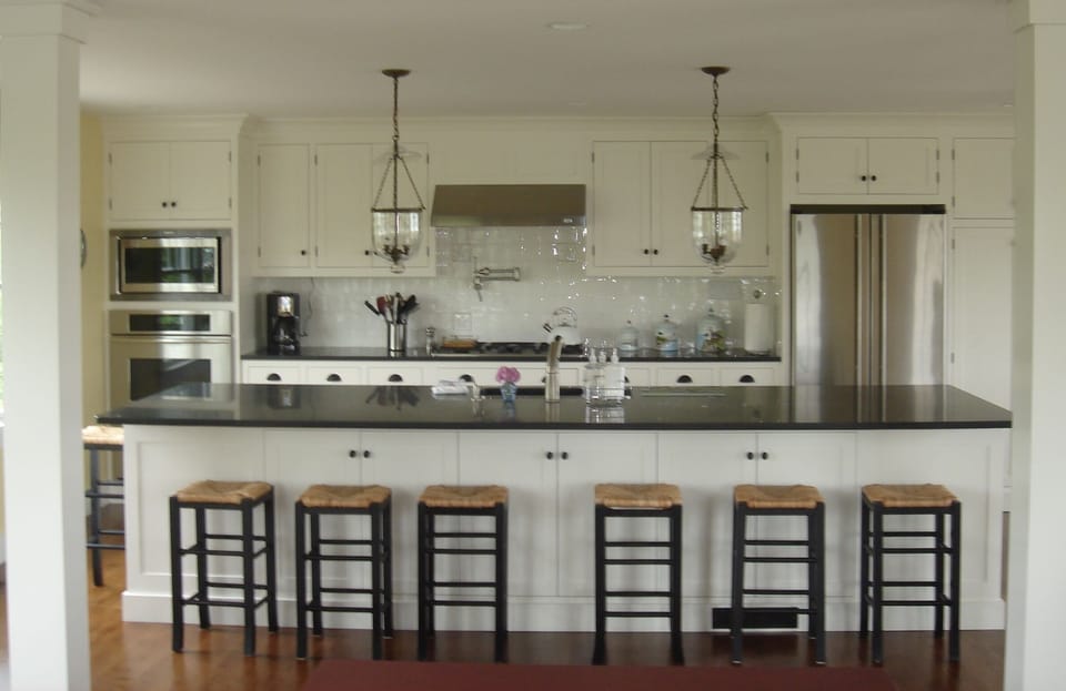 Kitchen has granite counters, stainless steel appliances.  Island seats 8.