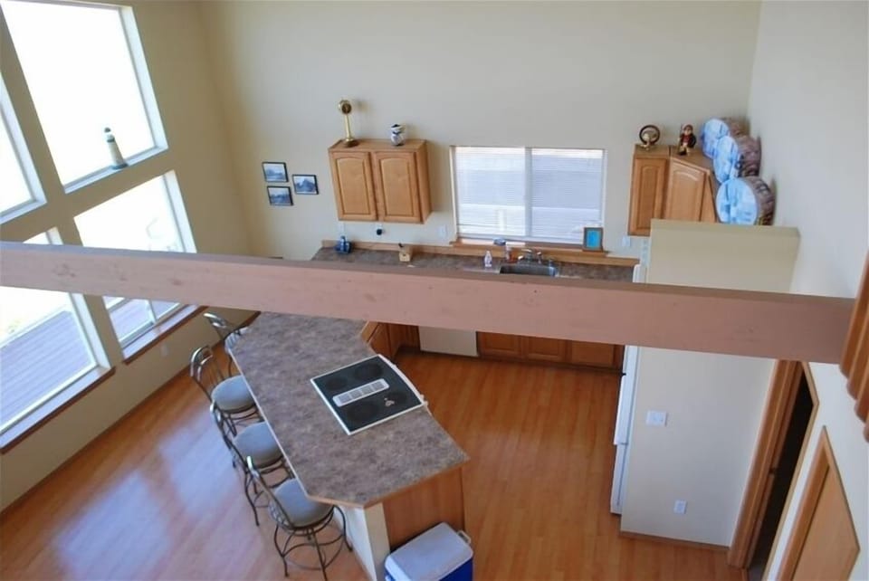 Upstairs view from the loft looking down to the kitchen