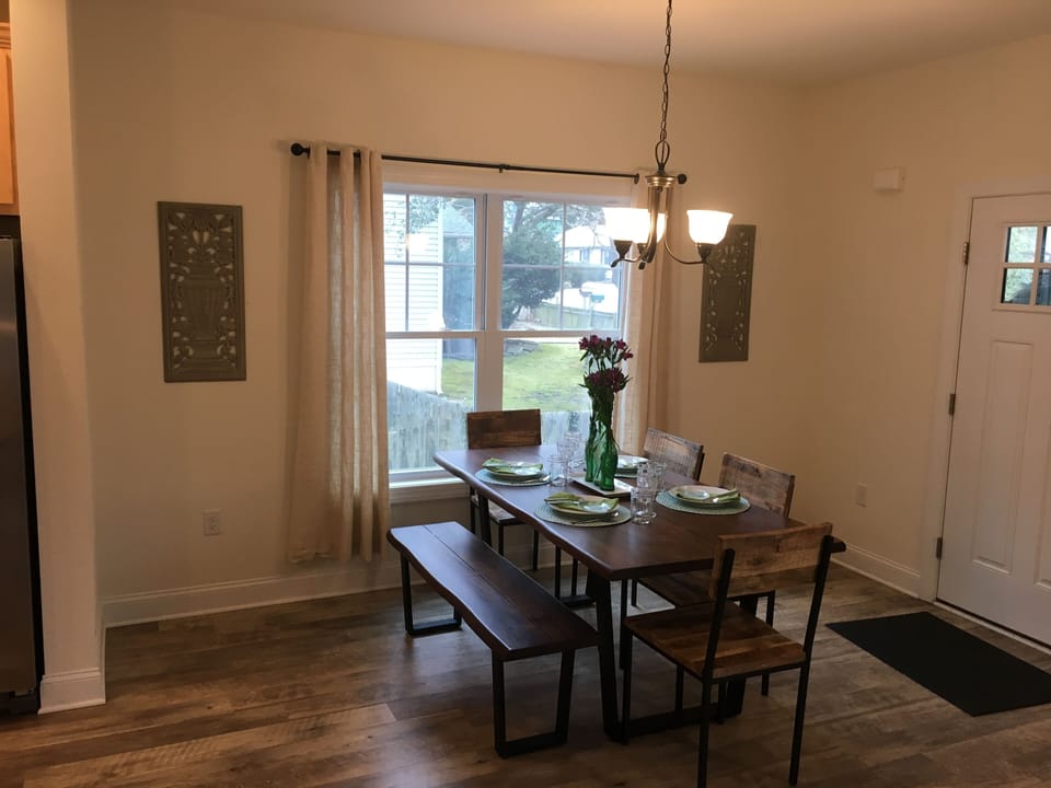 Dinning table room for up to 8 people.