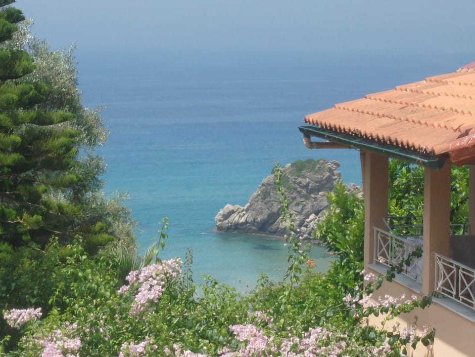 Terrace, overlooking the sea.
