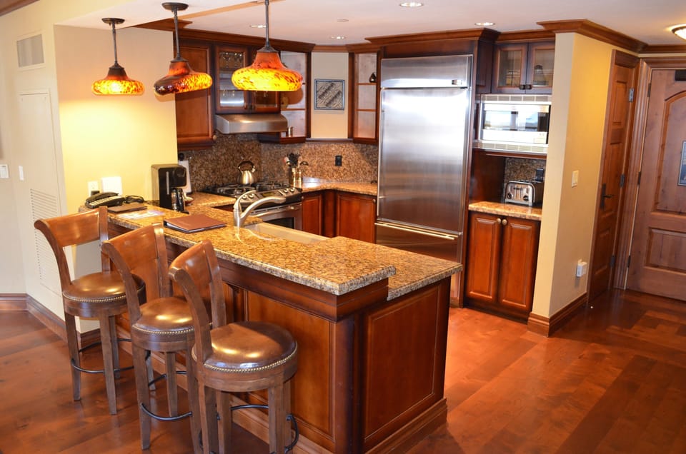Kitchen with stainless steel appliances and granite countertops