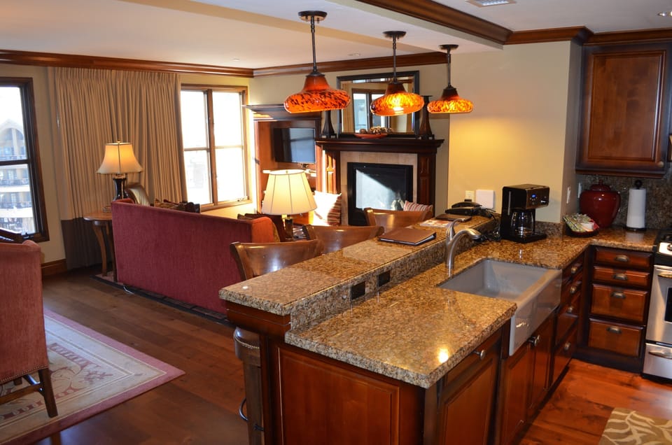 Kicthen and living room area of condo