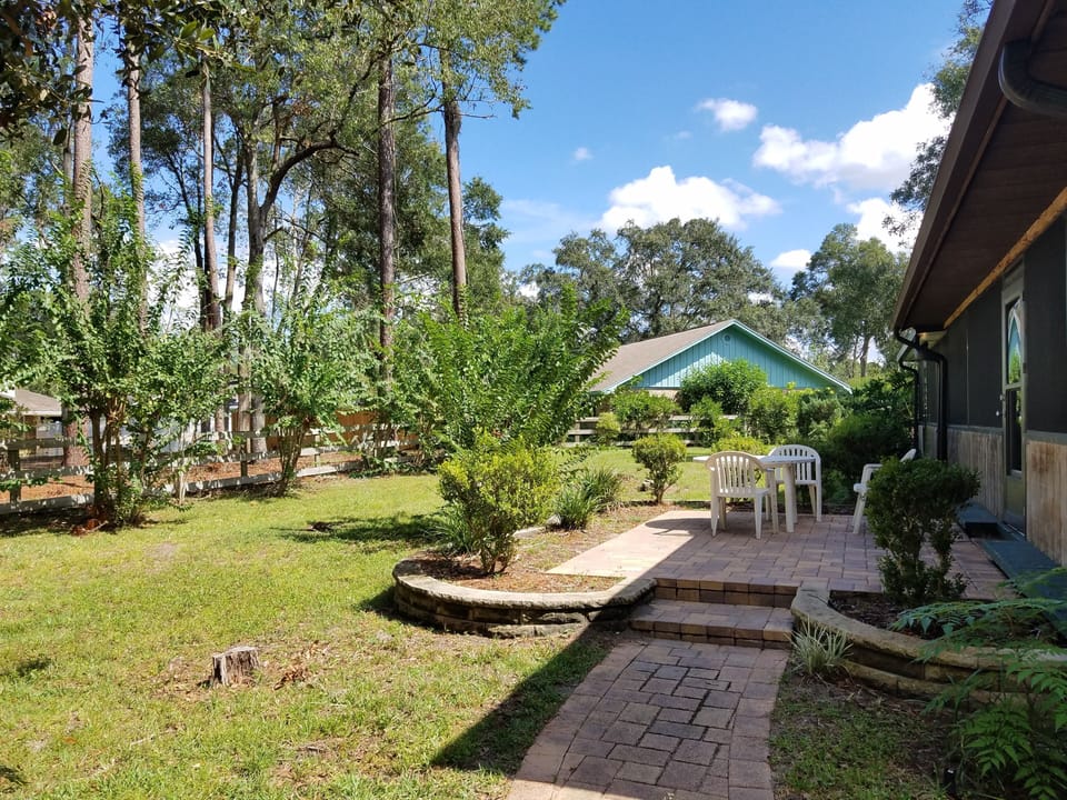 Picture perfect backyard with paved patio