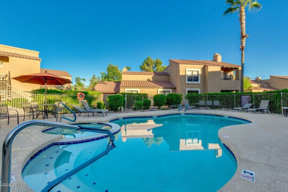 Heated pool and hot tub just steps from front door