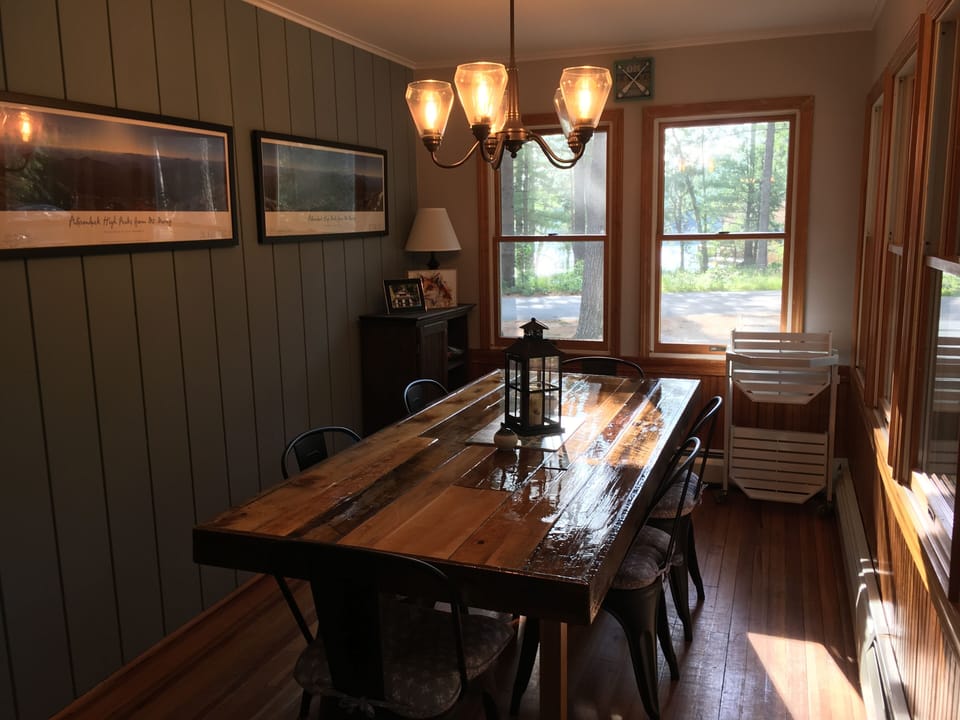 Front porch dining area with view of lake.