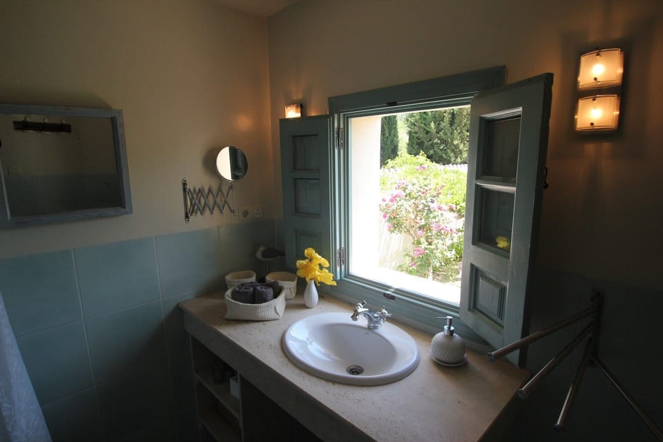 bathroom overlooking walled garden