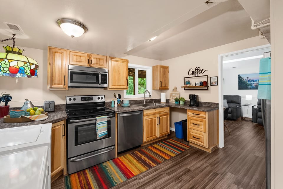 New countertops, hickory cabinets, stainless steel kitchen sink, dishwasher...