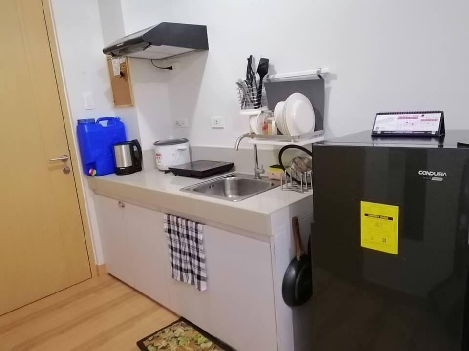 1-Bedroom with Den at Trees Residences