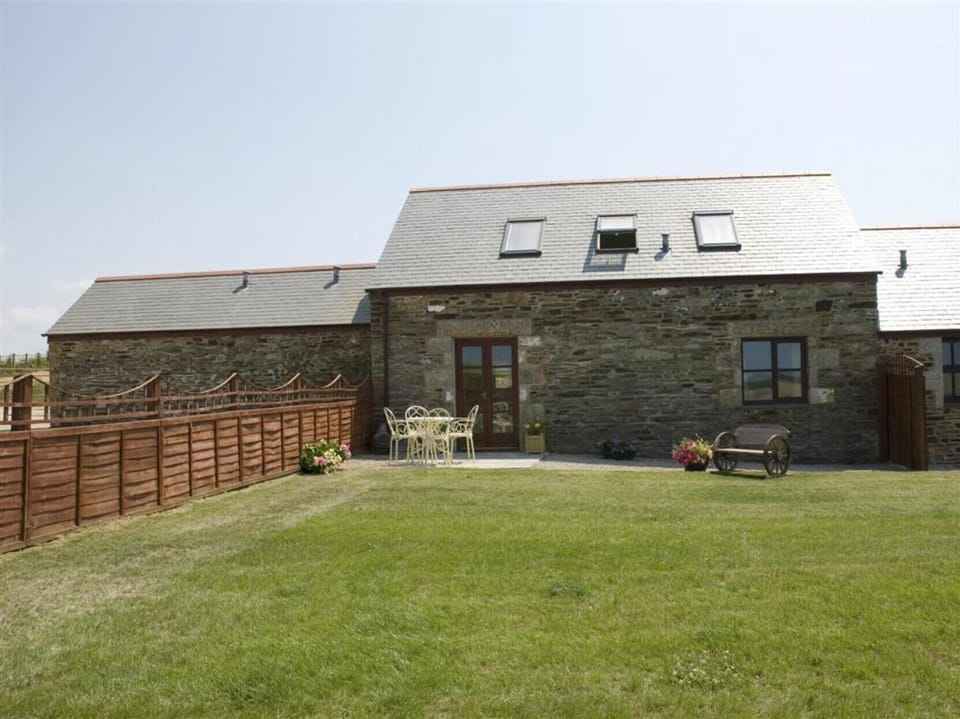 Rear view of property and garden