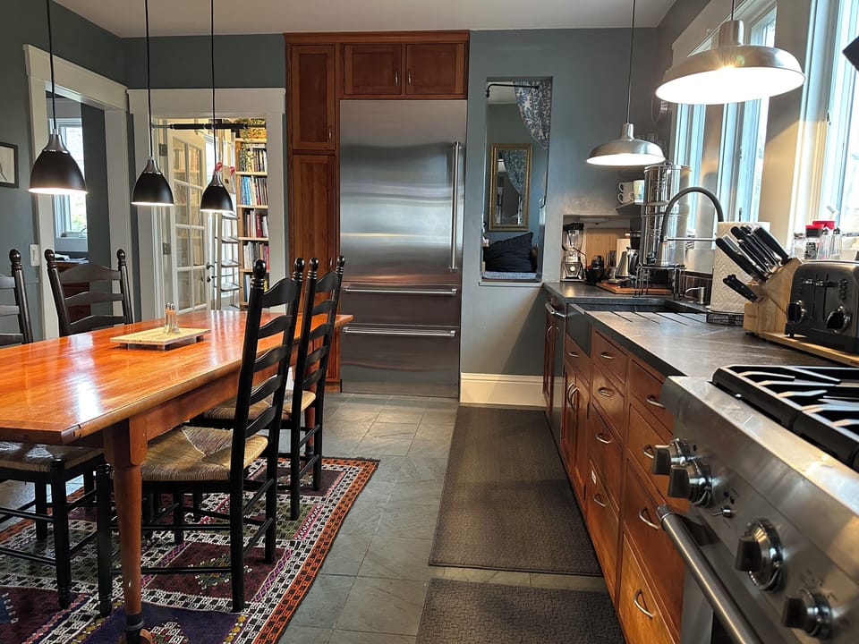 Farmhouse-style kitchen; table with six chairs