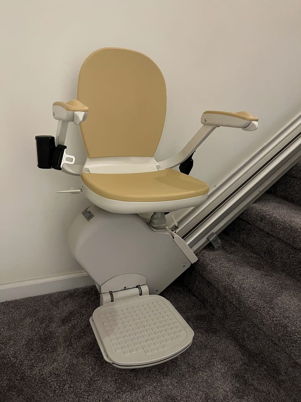 Chairlift on top stairs for guests needing assistance. 