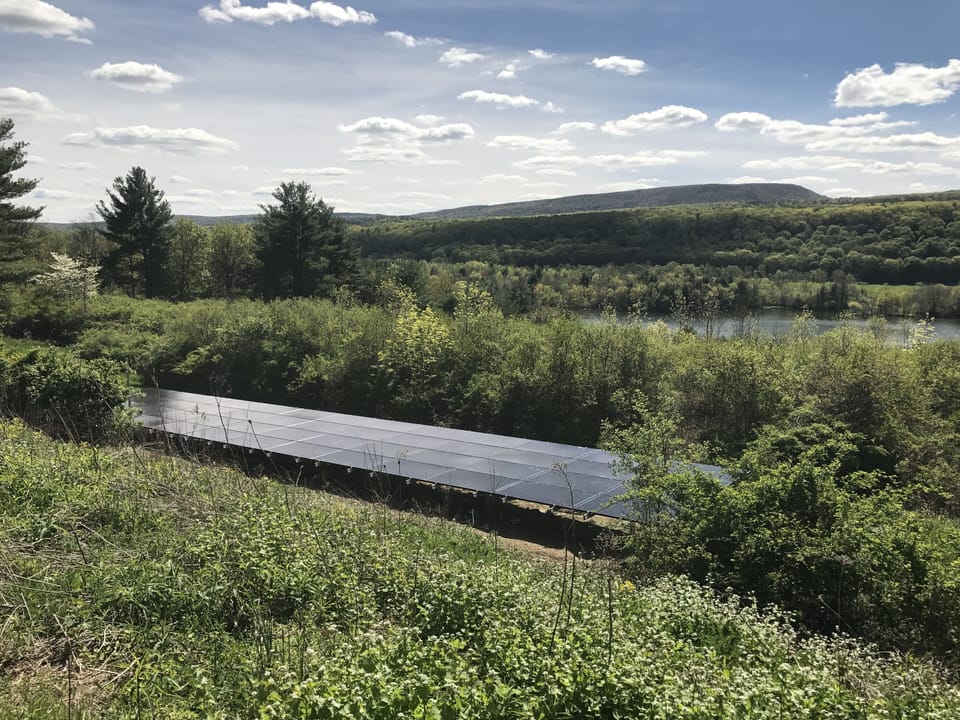 The home's power is now 100% solar. Yet it is invisible from the house and deck