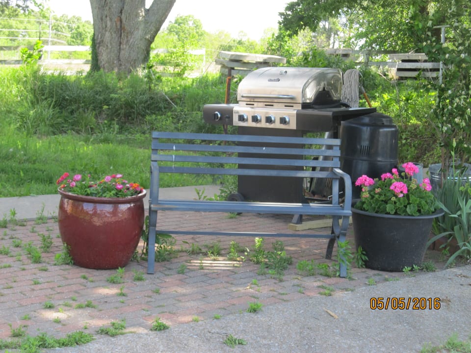 A Comfortable bench to watch the sunset and grill out.