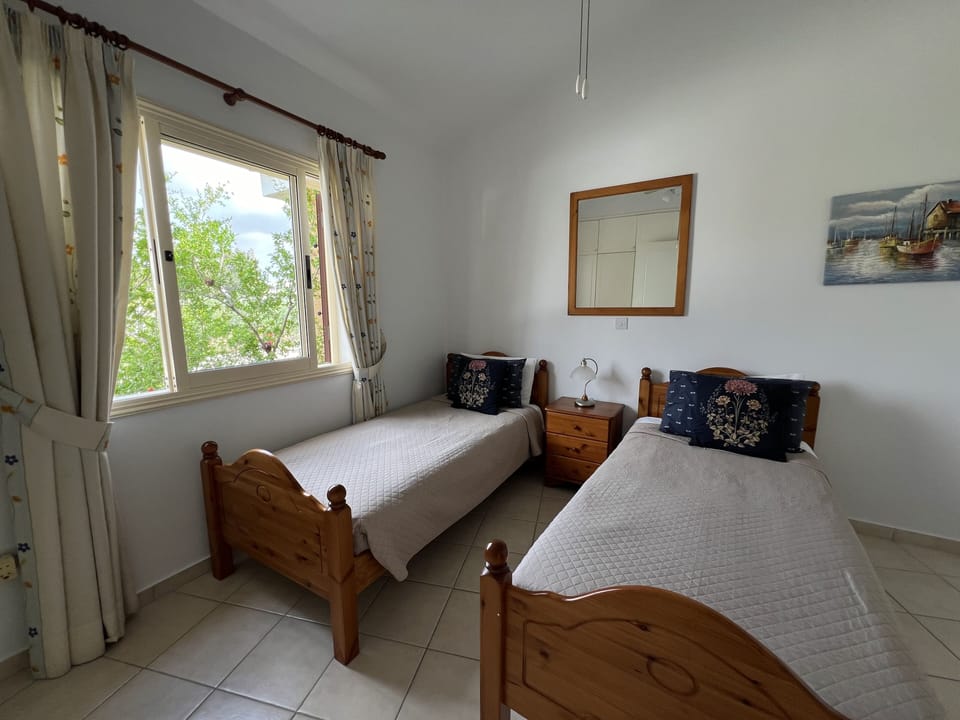 Second bedroom with two single beds