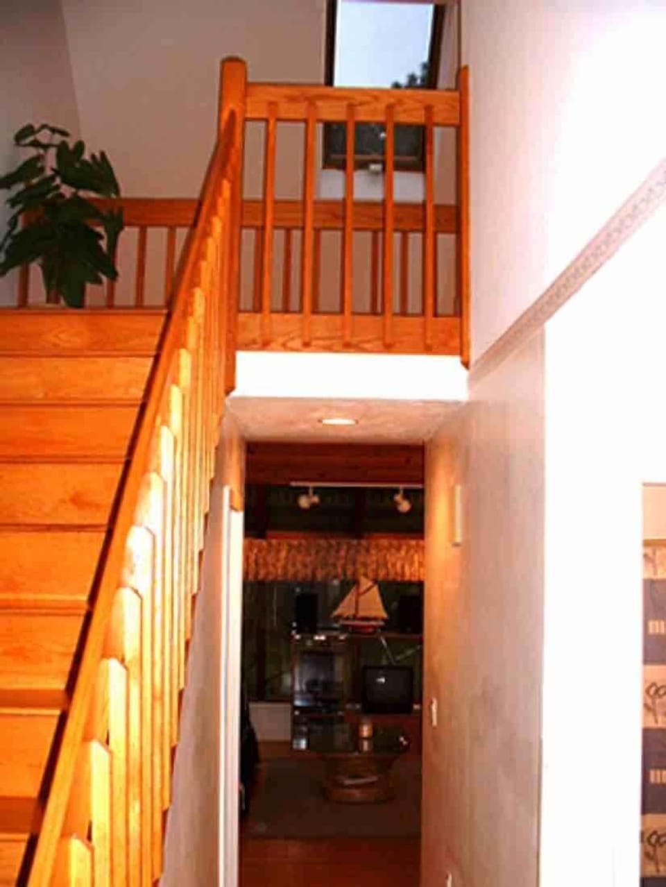 Open stairs and balcony to 2nd floor bed and bathroom.