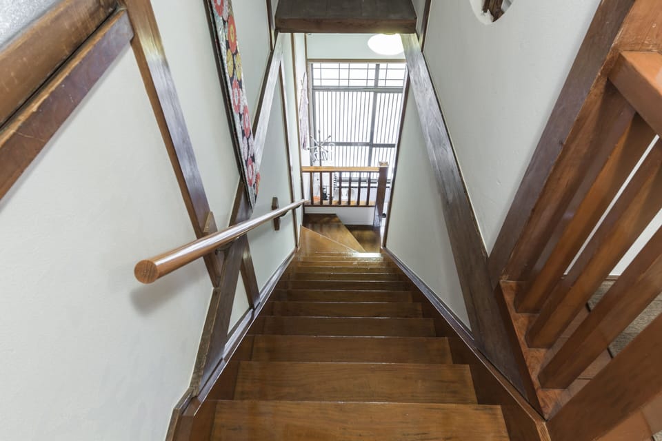 Classic wooden stairs framed by authentic Japanese design