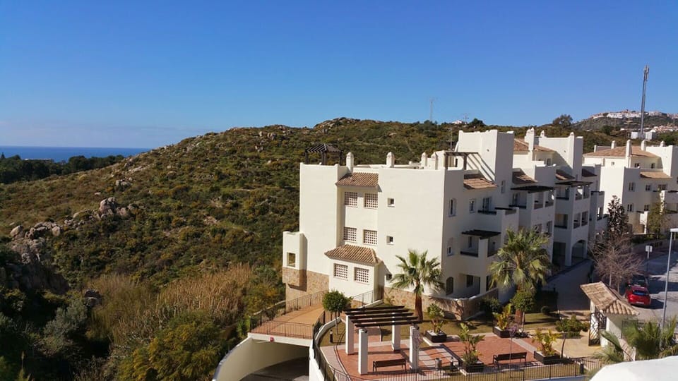 Side view of the apartment complex and resort with park below