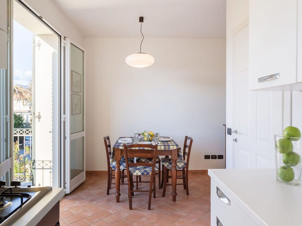 Room, Property, Dining Room, Interior Design, Furniture, Floor, Ceiling, Building, Yellow, House