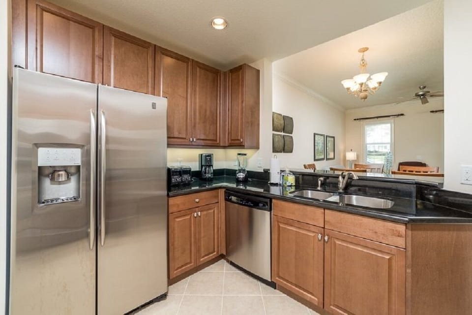 Fully equipped kitchen with granite counters and stainless steel appliances