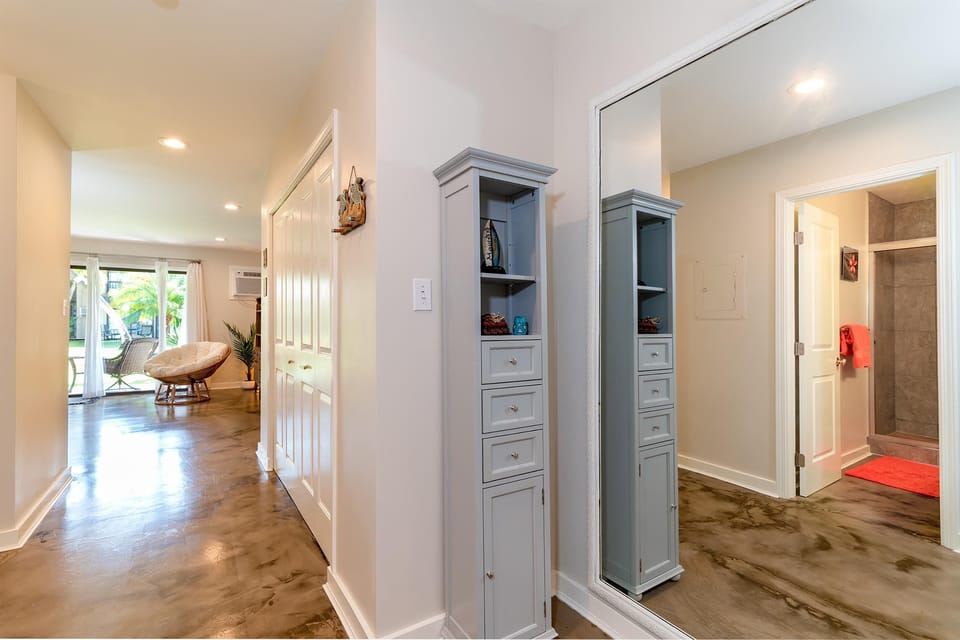 Full Length Mirror & Concrete Floors Throughout