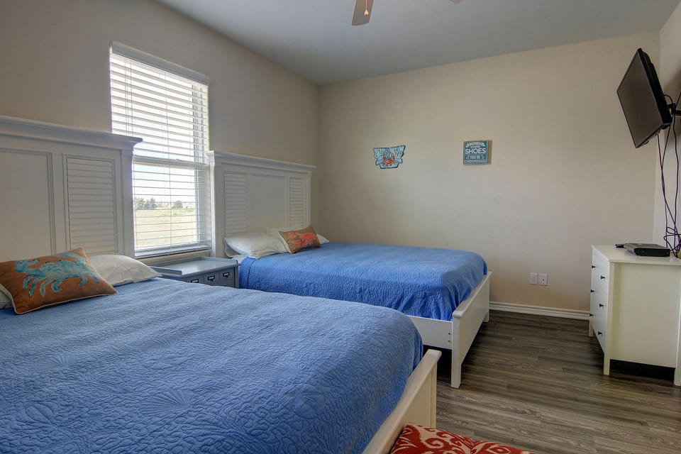 Upstairs bedroom with 2 queen beds