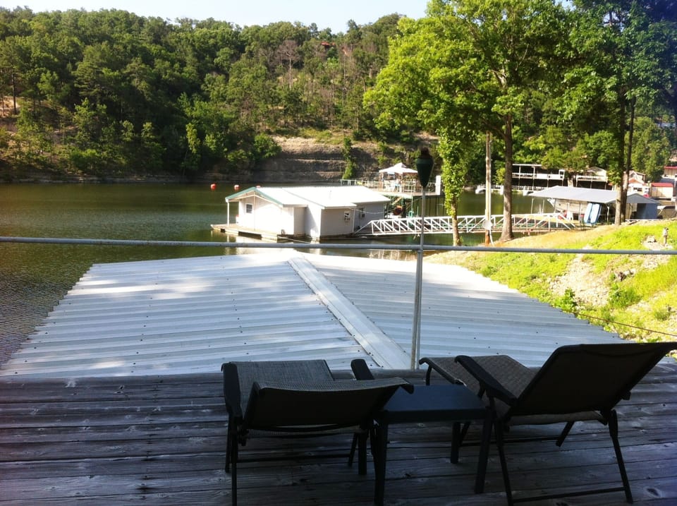 Supervise the kiddos from the dock as you watch them jump off the cliff!