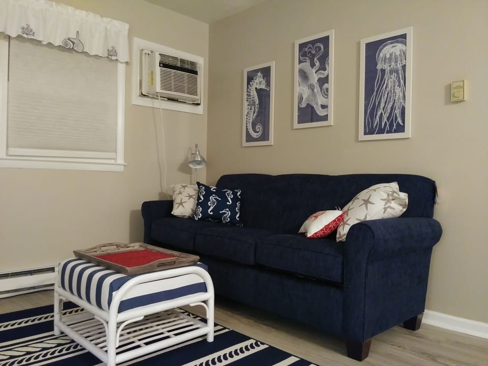 Freshly redecorated and painted. partial view of living room