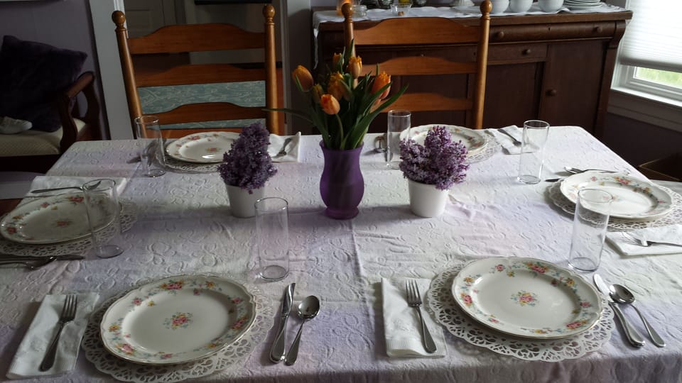 Breakfast table with lilacs and tulips from the yard.