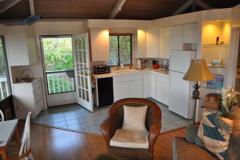 Living room and kitchenette at Plumeria Moon.