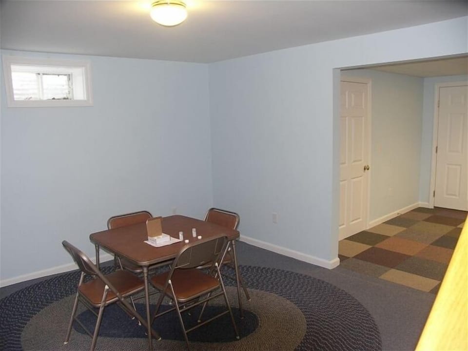basement room perfect for kids to hang out w/ stereo & games, lets parents relax